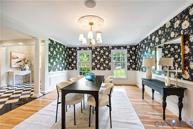 an empty room with a ceiling fan and a window
