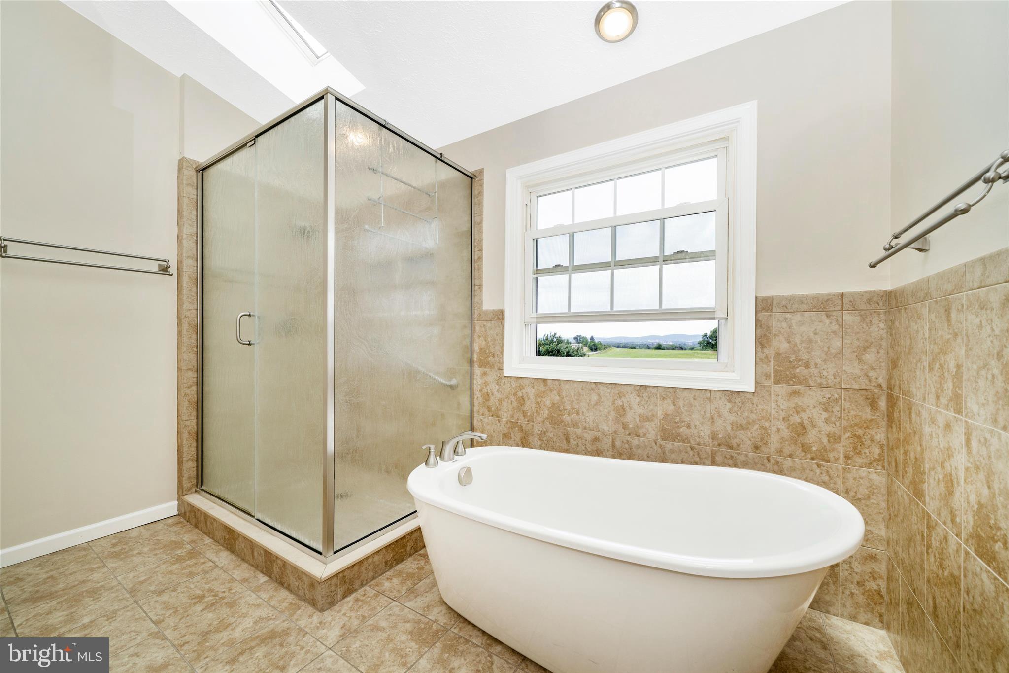 9534 Liberty Road Frederick, MD 21701 - Photo 33 of 70 a white bath tub sitting next to a window