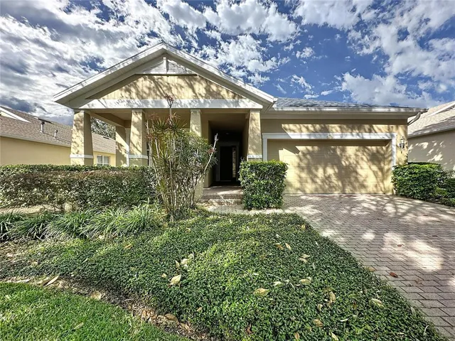 a view of a porch with wooden floor and fence