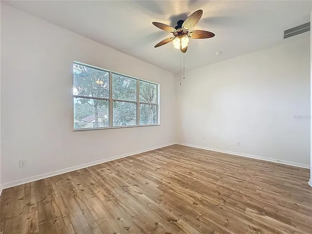 a view of a house with a garden