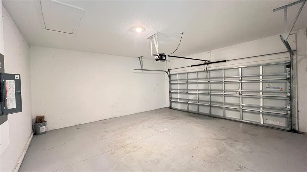 16466 Glassy Loch Loop Clermont, FL 34714 - Photo 12 of 37 a view of a garage room