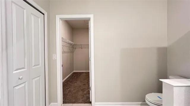 a bathroom with a toilet