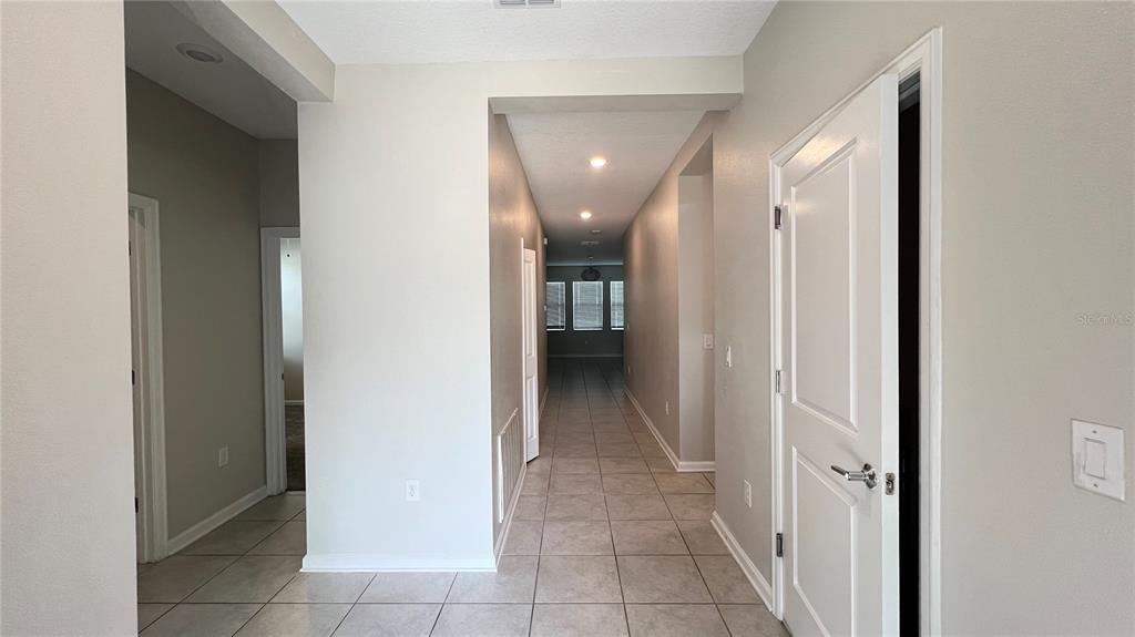 16466 Glassy Loch Loop Clermont, FL 34714 - Photo 8 of 37 a view of a hallway