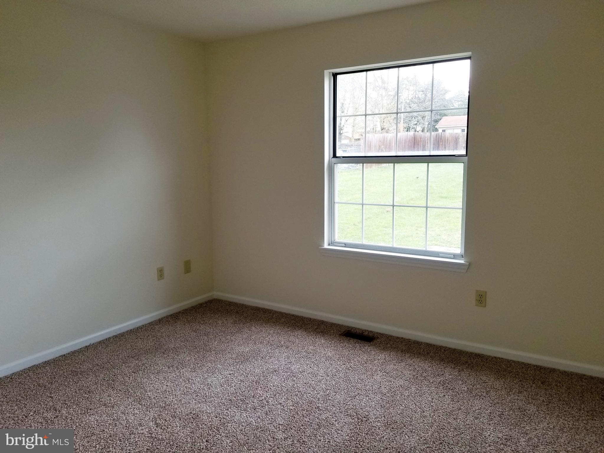 135 Truman Road Inwood, WV 25428 - Photo 12 of 30 an empty room with a window