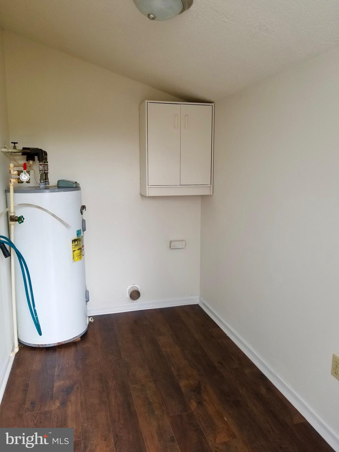 135 Truman Road Inwood, WV 25428 - Photo 25 of 30 a view of utility room with washer and dryer
