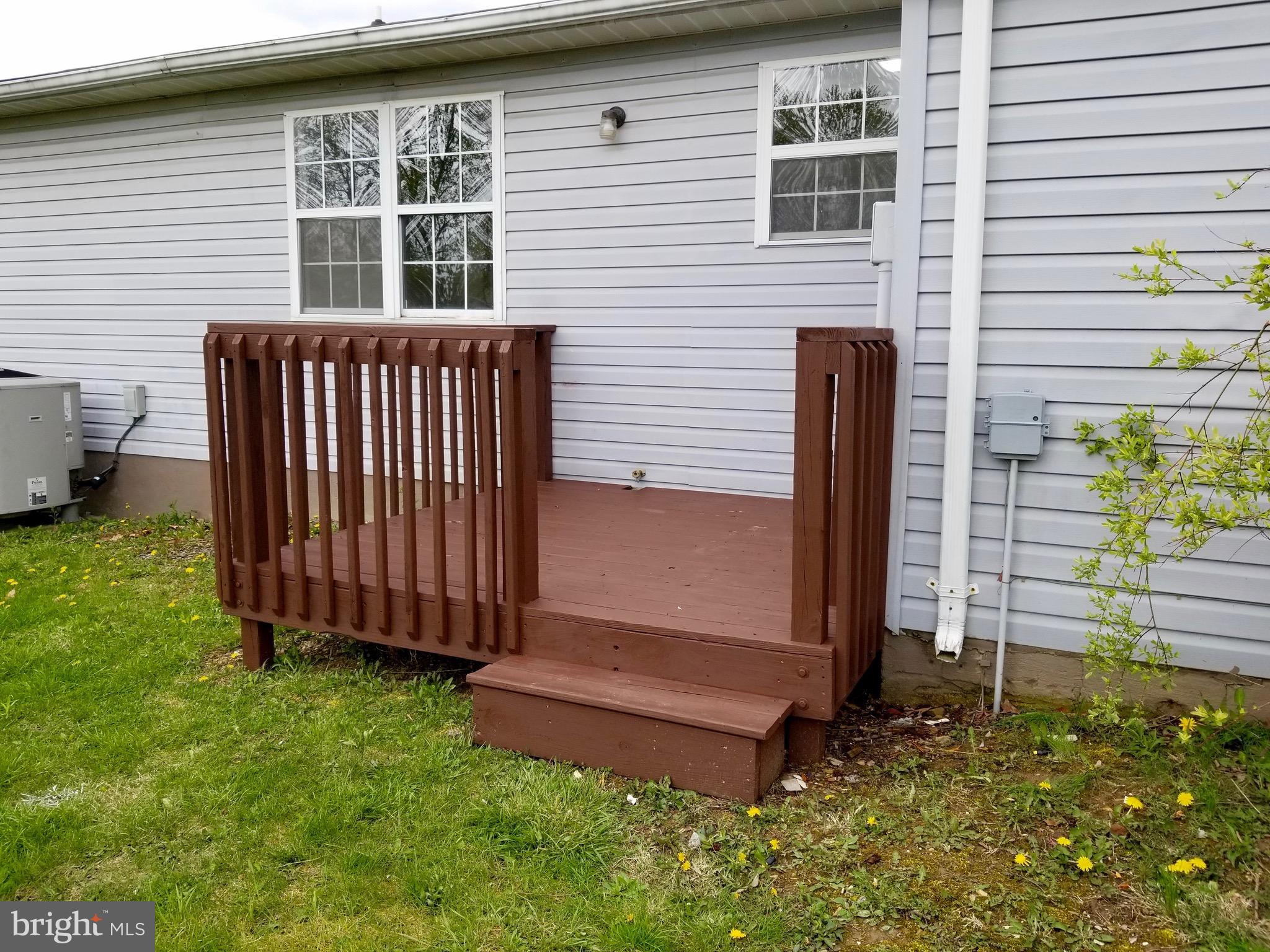 135 Truman Road Inwood, WV 25428 - Photo 26 of 30 a view of a backyard with a garden