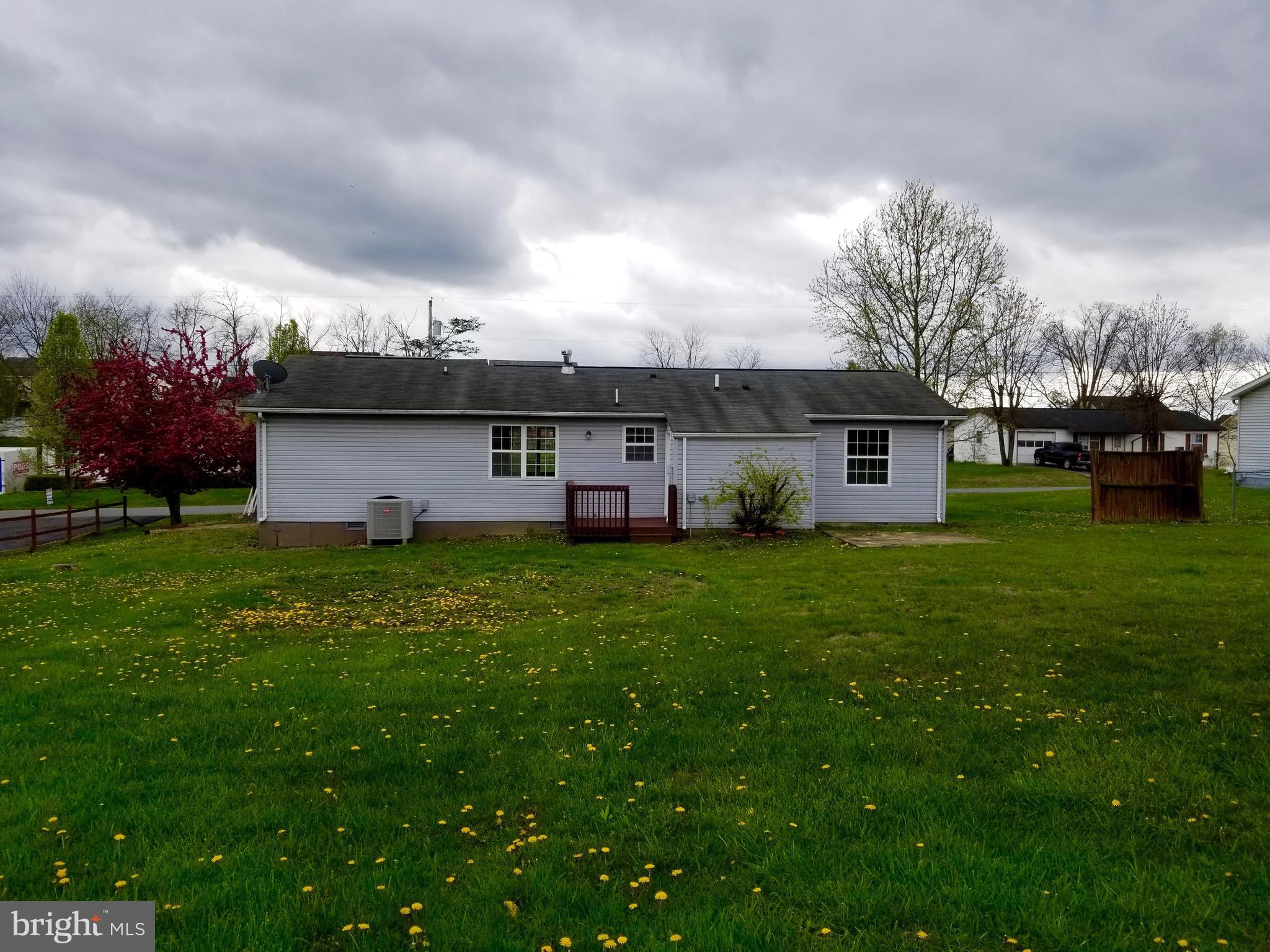135 Truman Road Inwood, WV 25428 - Photo 28 of 30 a view of a house with a garden
