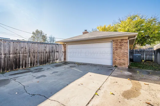 a front view of a house with a garage