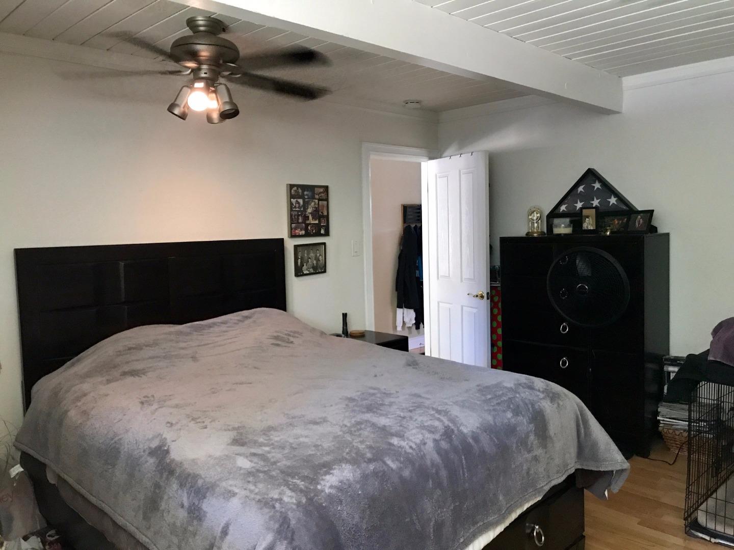 6087 Bollinger Road Cupertino, CA 95014 - Photo 9 of 20 a bedroom with a bed and a closet