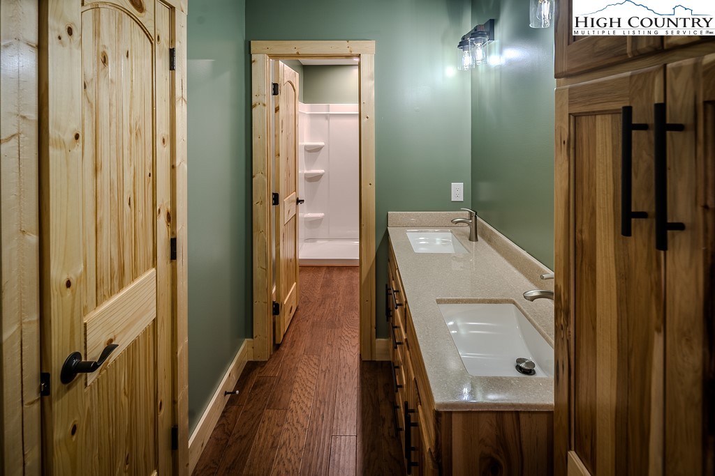 111 Village Cluster Road Beech Mountain, NC 28604 - Photo 19 of 27 a bathroom with a mirror