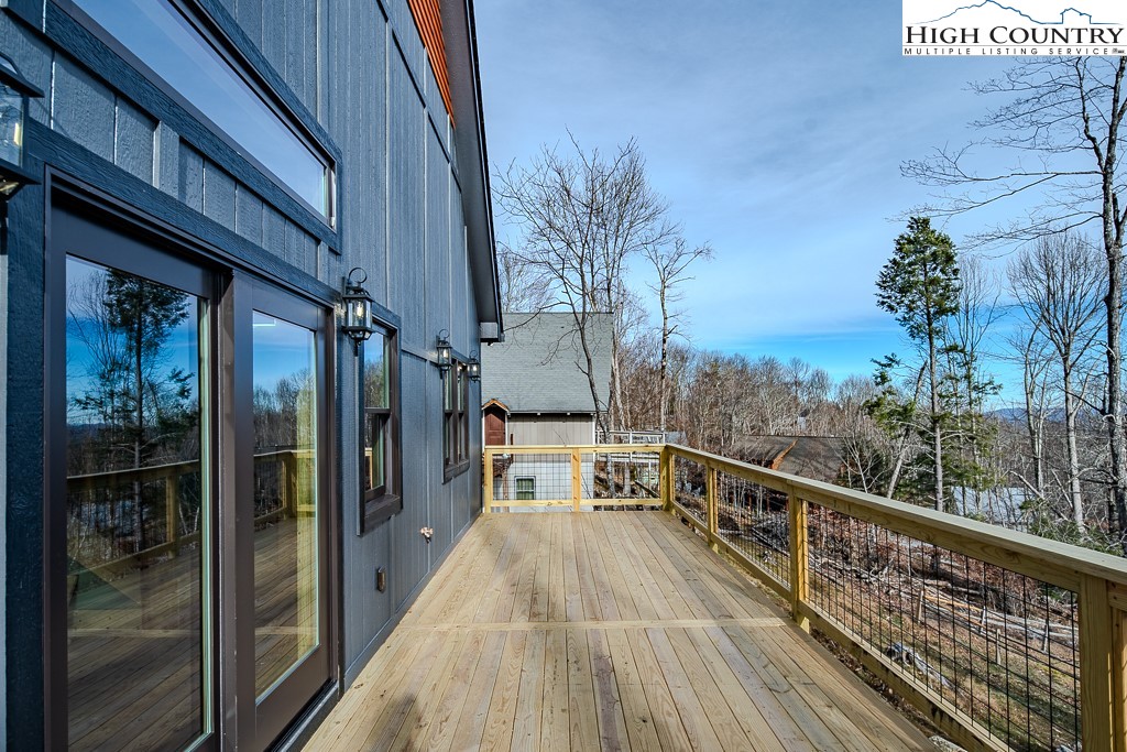 111 Village Cluster Road Beech Mountain, NC 28604 - Photo 24 of 27 a view of balcony with couch