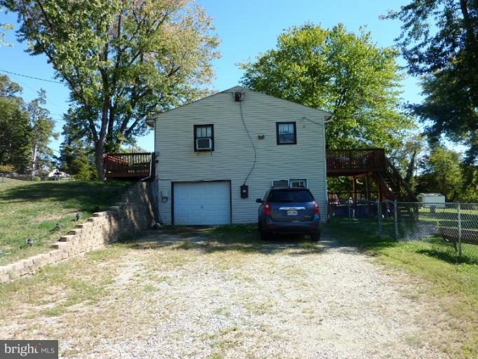 4117 Anderson Road Triangle, VA 22172 - Photo 2 of 30 a view of a house with a yard