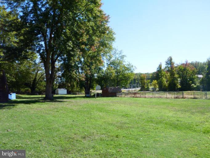 4117 Anderson Road Triangle, VA 22172 - Photo 12 of 30 a view of a park with large trees