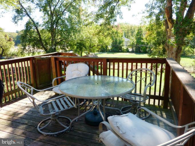 4117 Anderson Road Triangle, VA 22172 - Photo 14 of 30 a view of a chairs and table on the deck