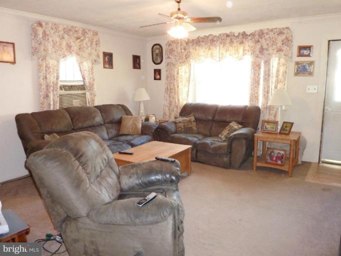 4117 Anderson Road Triangle, VA 22172 - Photo 18 of 30 a living room with furniture and a large window