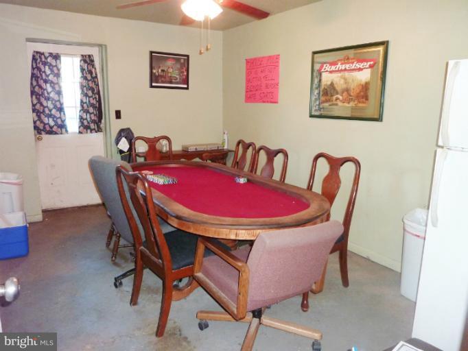 4117 Anderson Road Triangle, VA 22172 - Photo 25 of 30 a view of a dining room with furniture