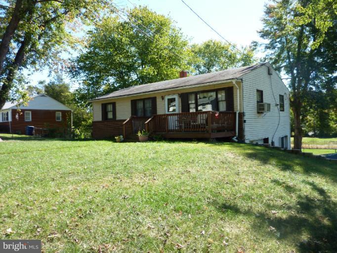 4117 Anderson Road Triangle, VA 22172 - Photo 6 of 30 front view of a house with a yard
