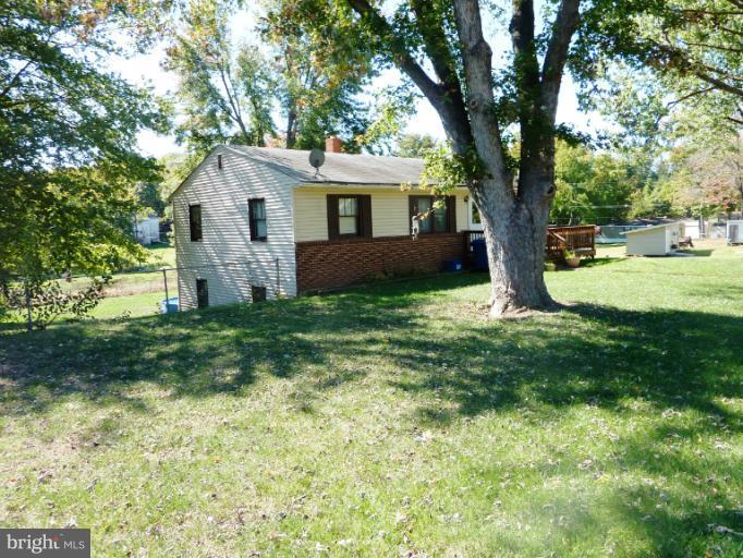 4117 Anderson Road Triangle, VA 22172 - Photo 7 of 30 a view of a house with a yard