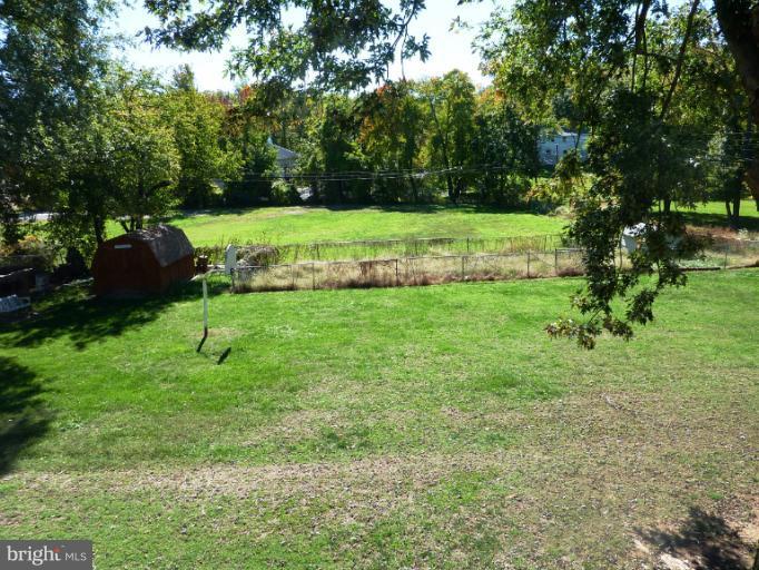 4117 Anderson Road Triangle, VA 22172 - Photo 10 of 30 a view of a backyard with large trees