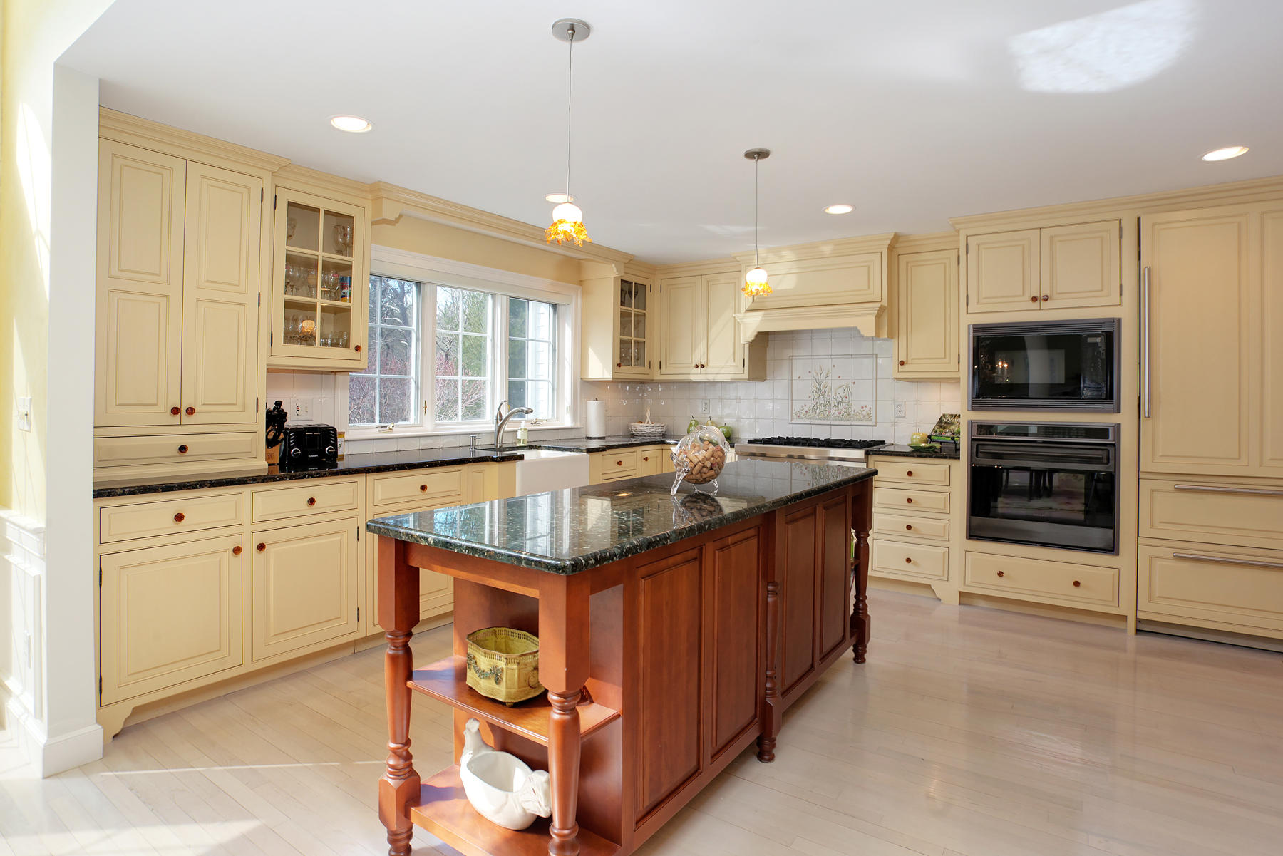 81 Farm Valley Road Osterville, MA 02655 - Photo 11 of 35 a kitchen with stainless steel appliances a sink stove and cabinets