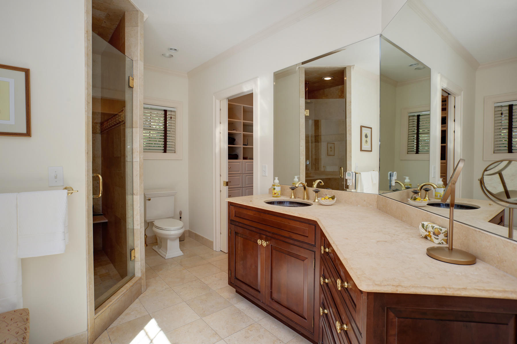 81 Farm Valley Road Osterville, MA 02655 - Photo 16 of 35 a spacious bathroom with a sink double vanity and a toilet