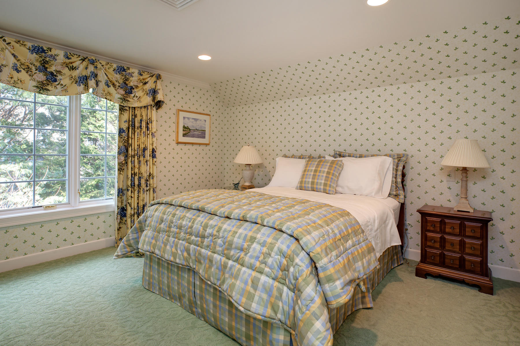 81 Farm Valley Road Osterville, MA 02655 - Photo 20 of 35 a bedroom with a bed and a night stand