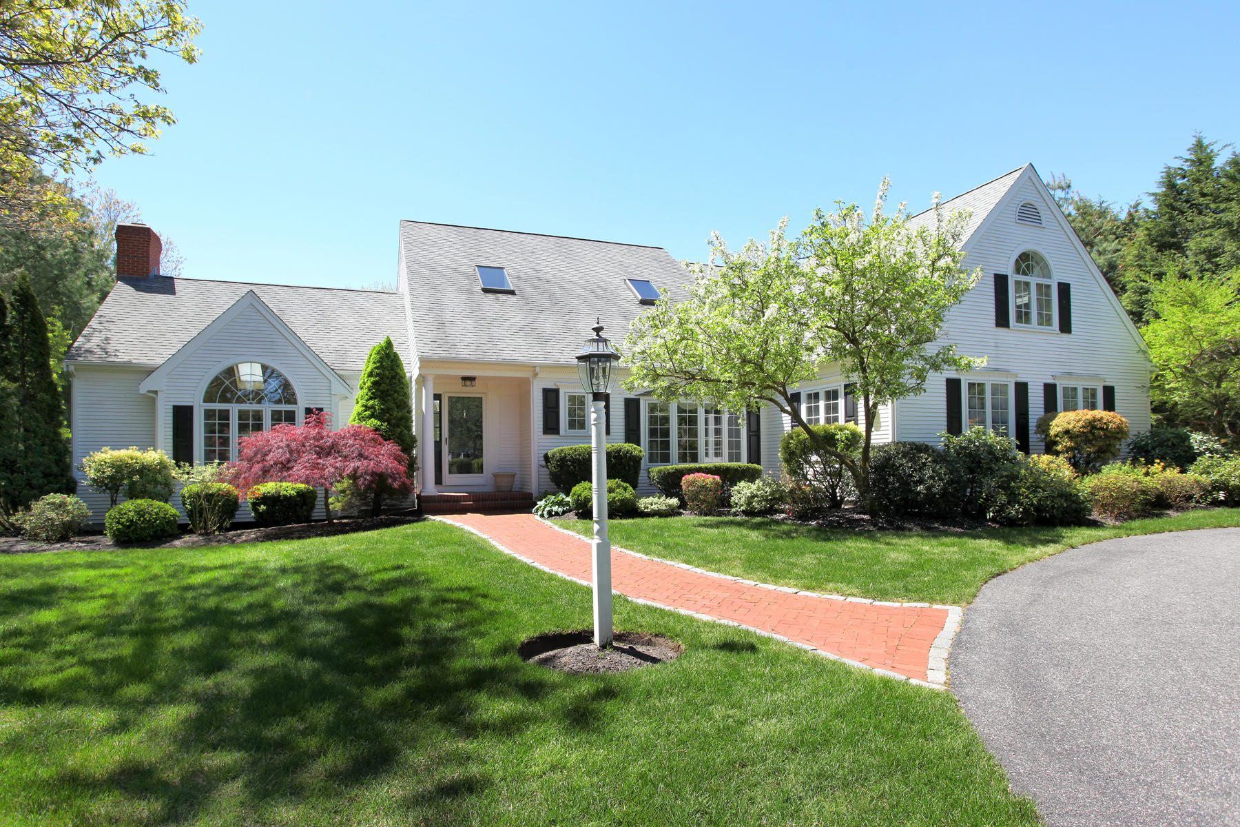 81 Farm Valley Road Osterville, MA 02655 - Photo 3 of 35 a front view of house with yard and green space