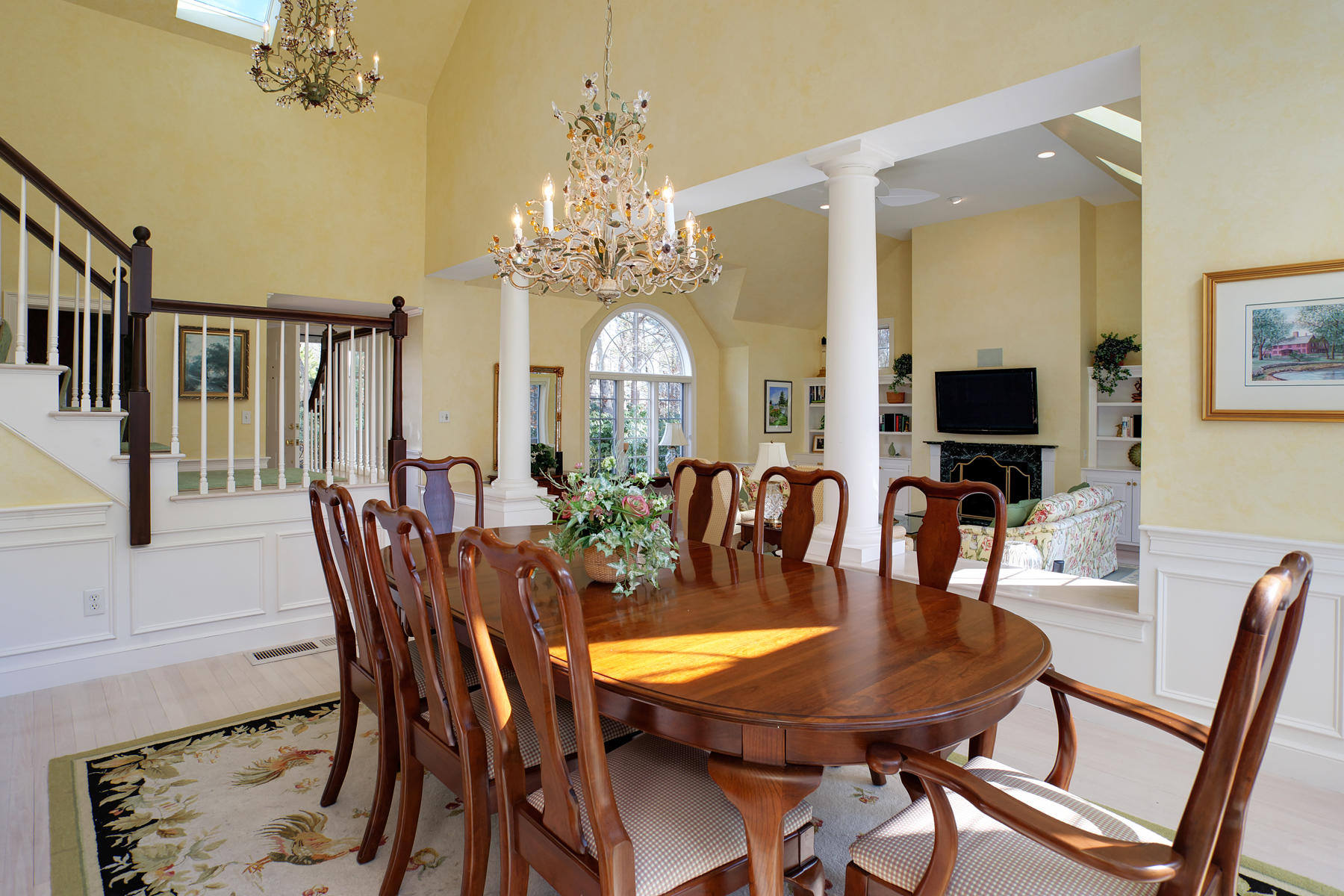81 Farm Valley Road Osterville, MA 02655 - Photo 8 of 35 a view of a dining room with furniture and a chandelier