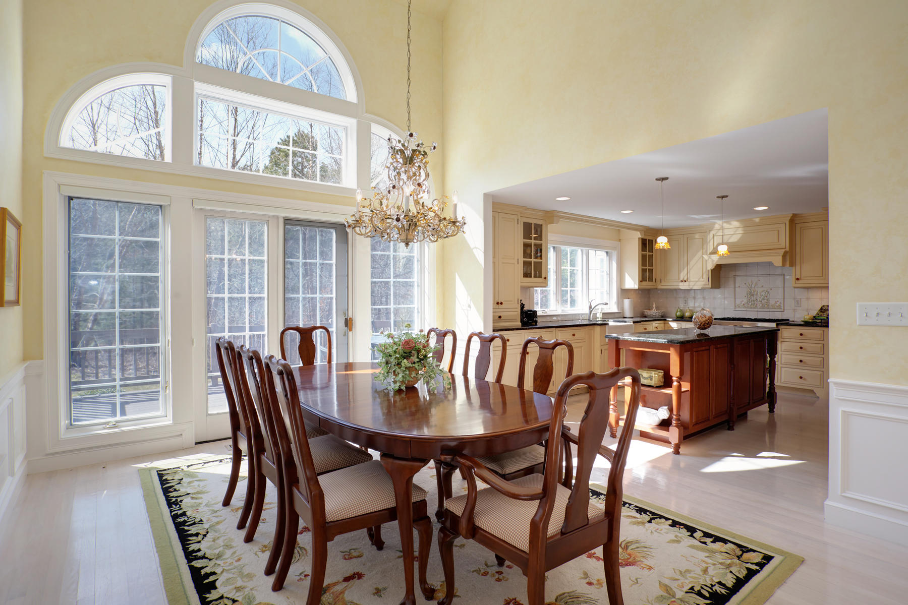 81 Farm Valley Road Osterville, MA 02655 - Photo 10 of 35 a view of a dining room with furniture and a chandelier