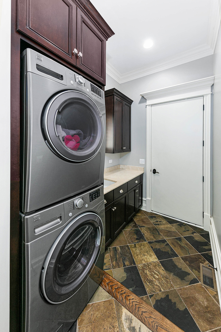 900 East Hillside Road Naperville, IL 60540 - Photo 19 of 73 a utility room with sink dryer and washer
