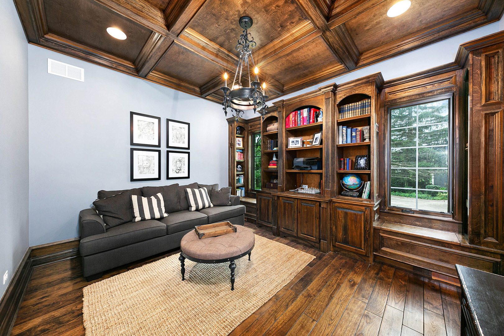 900 East Hillside Road Naperville, IL 60540 - Photo 27 of 73 a living room with furniture and a wooden floor