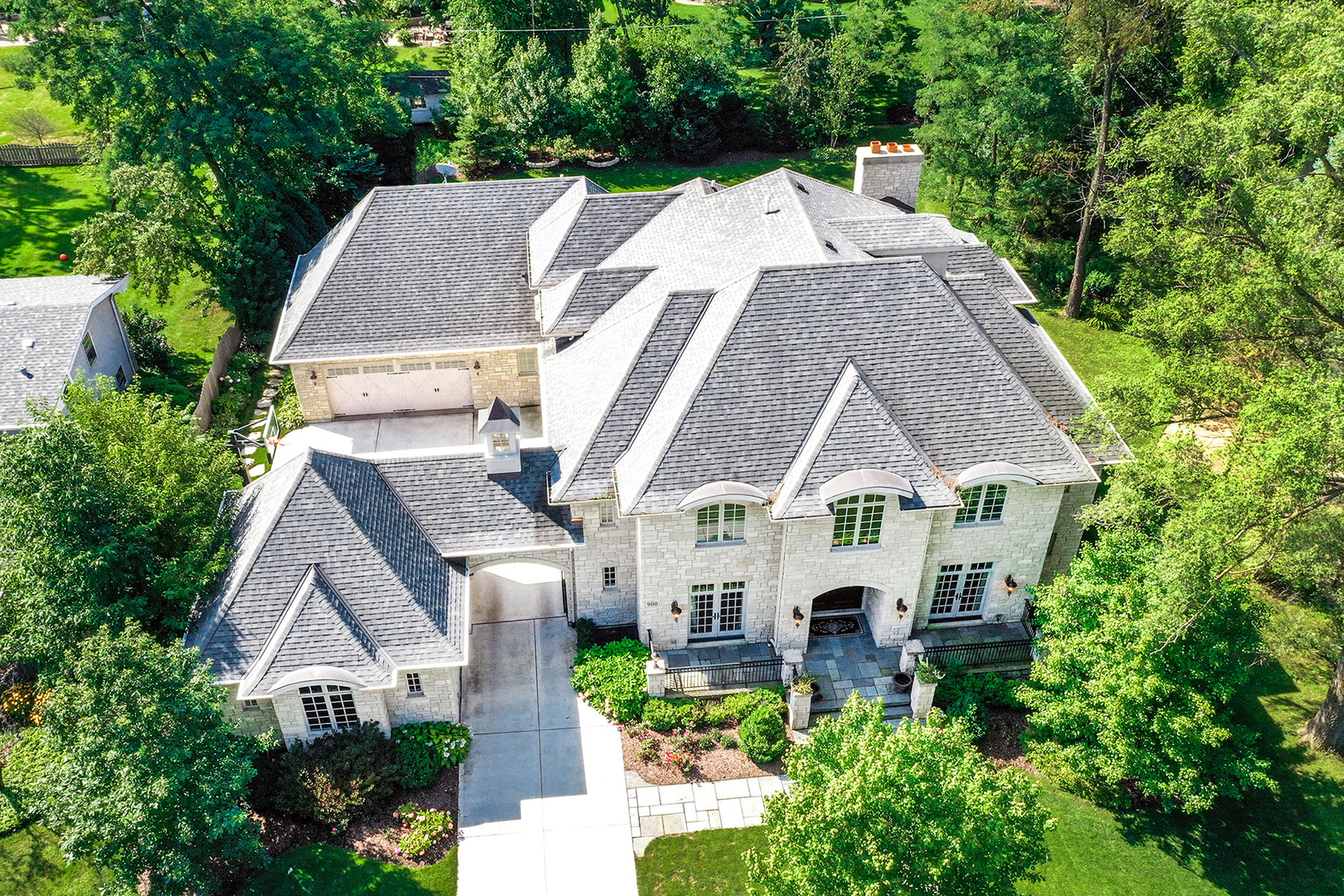 900 East Hillside Road Naperville, IL 60540 - Photo 4 of 73 an aerial view of a house with yard and green space