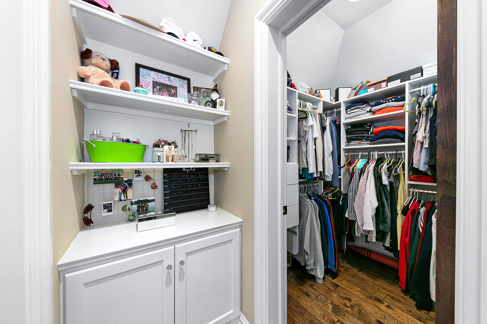 900 East Hillside Road Naperville, IL 60540 - Photo 47 of 73 a view of walk in closet with clothes and shoes