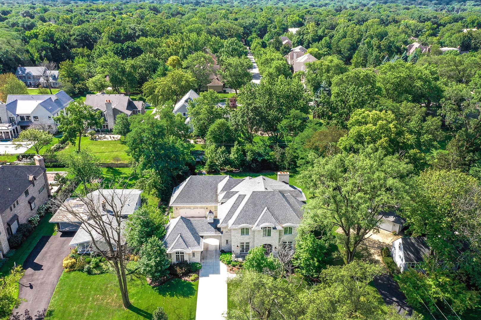 900 East Hillside Road Naperville, IL 60540 - Photo 6 of 73 an aerial view of a house with yard swimming pool and outdoor seating