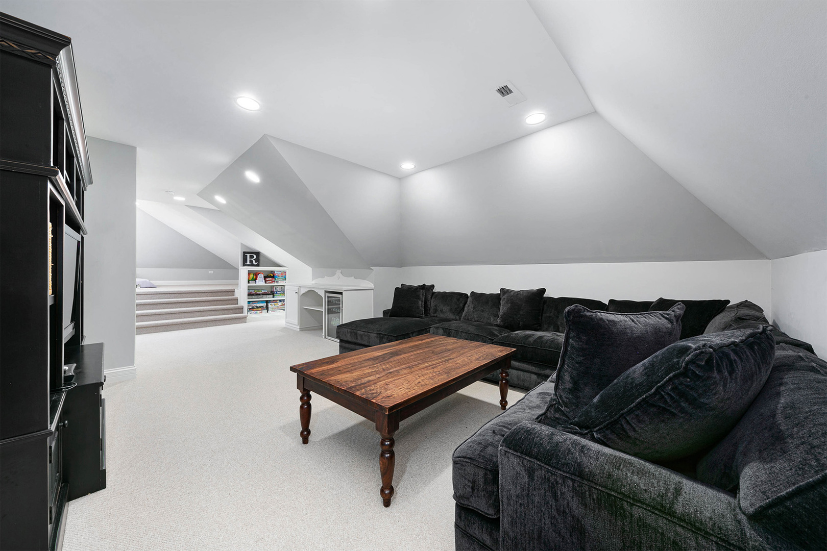 900 East Hillside Road Naperville, IL 60540 - Photo 56 of 73 a living room with furniture and a ceiling fan