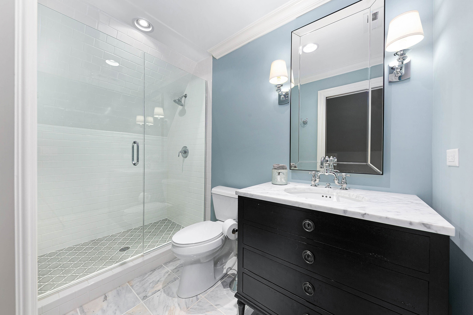 900 East Hillside Road Naperville, IL 60540 - Photo 57 of 73 a bathroom with a sink a toilet and shower