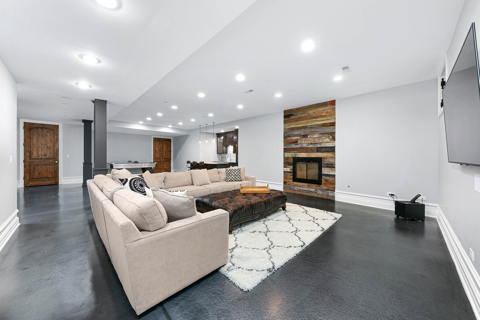 900 East Hillside Road Naperville, IL 60540 - Photo 59 of 73 a living room with furniture and a flat screen tv
