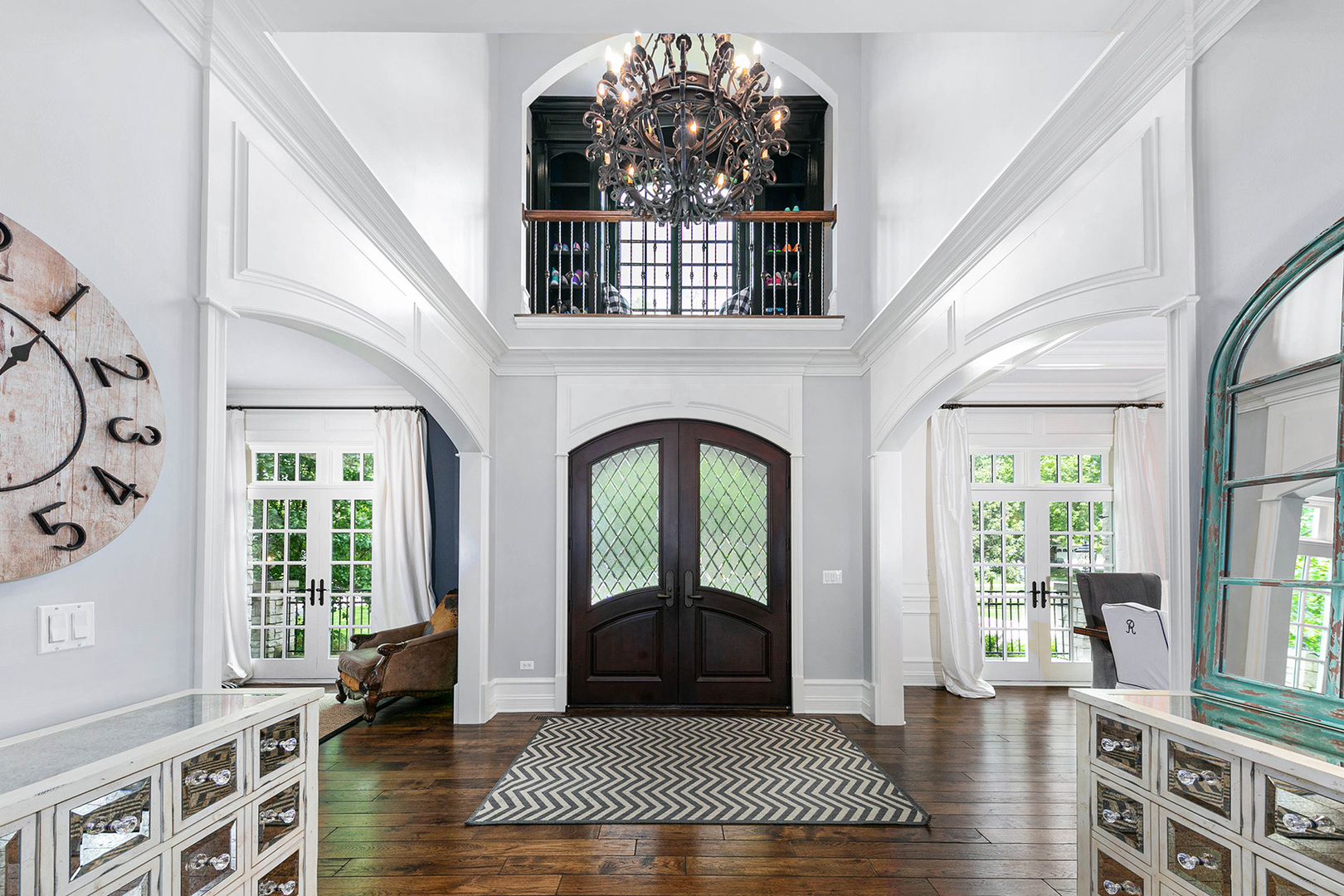 900 East Hillside Road Naperville, IL 60540 - Photo 7 of 73 a view of entryway with wooden floor