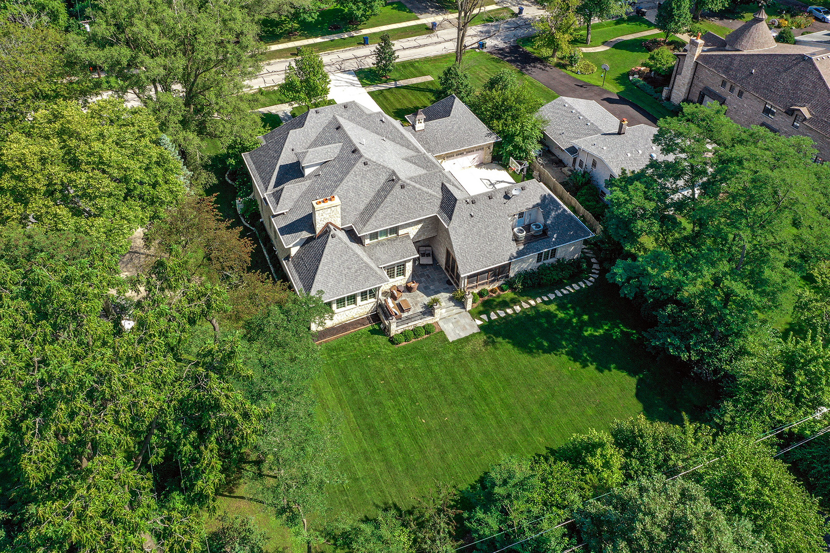900 East Hillside Road Naperville, IL 60540 - Photo 69 of 73 an aerial view of residential house with outdoor space and trees all around