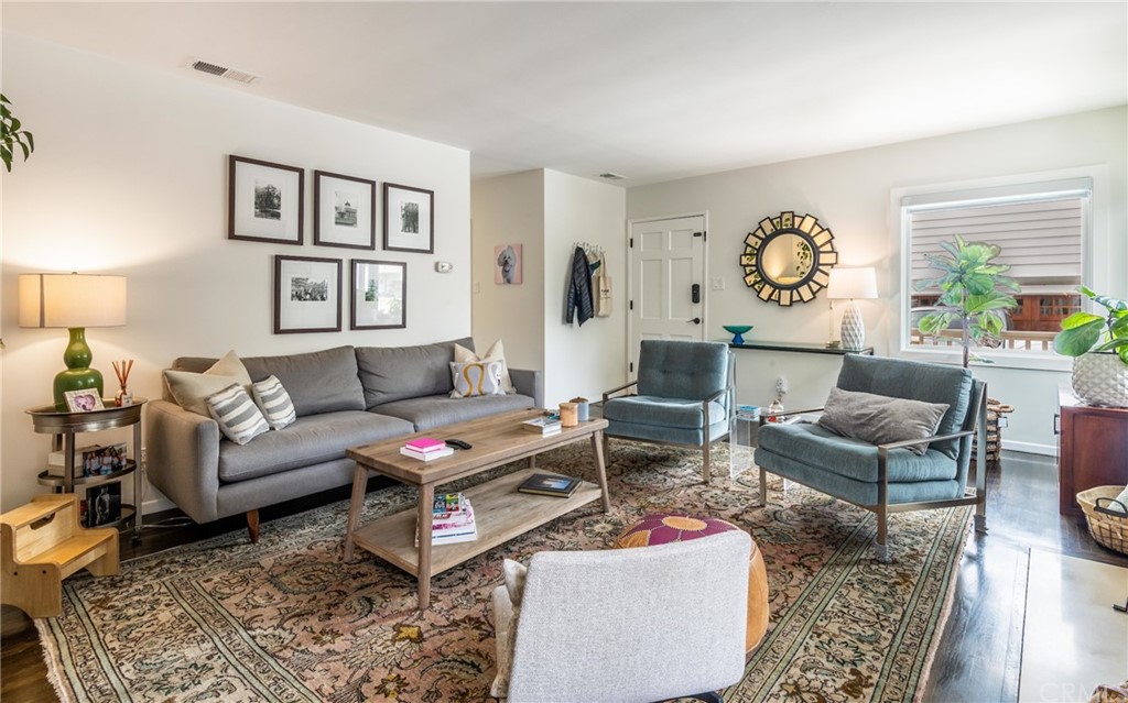 316 7th Street Manhattan Beach, CA 90266 - Photo 12 of 34 a living room with furniture and wooden floor