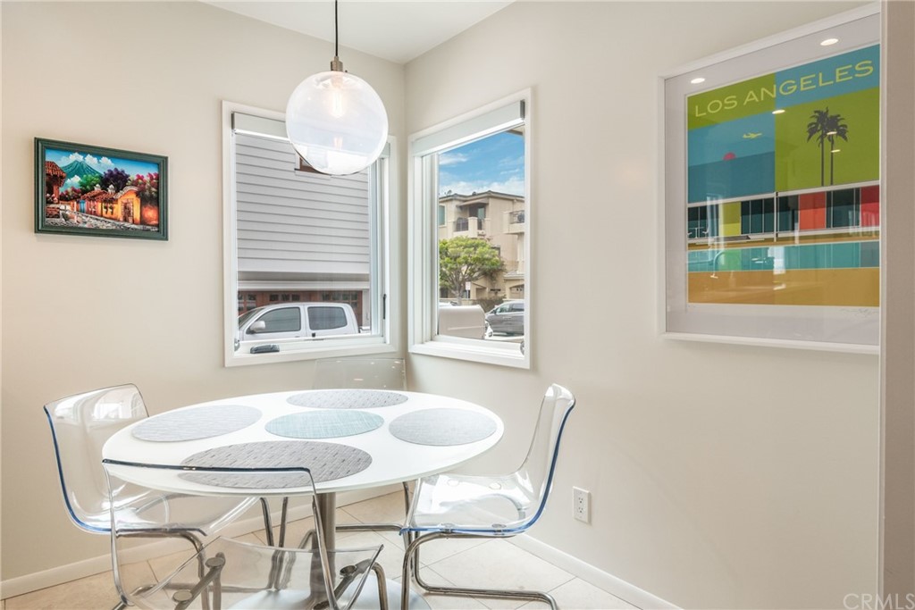 316 7th Street Manhattan Beach, CA 90266 - Photo 17 of 34 a view of a dining room with furniture and window