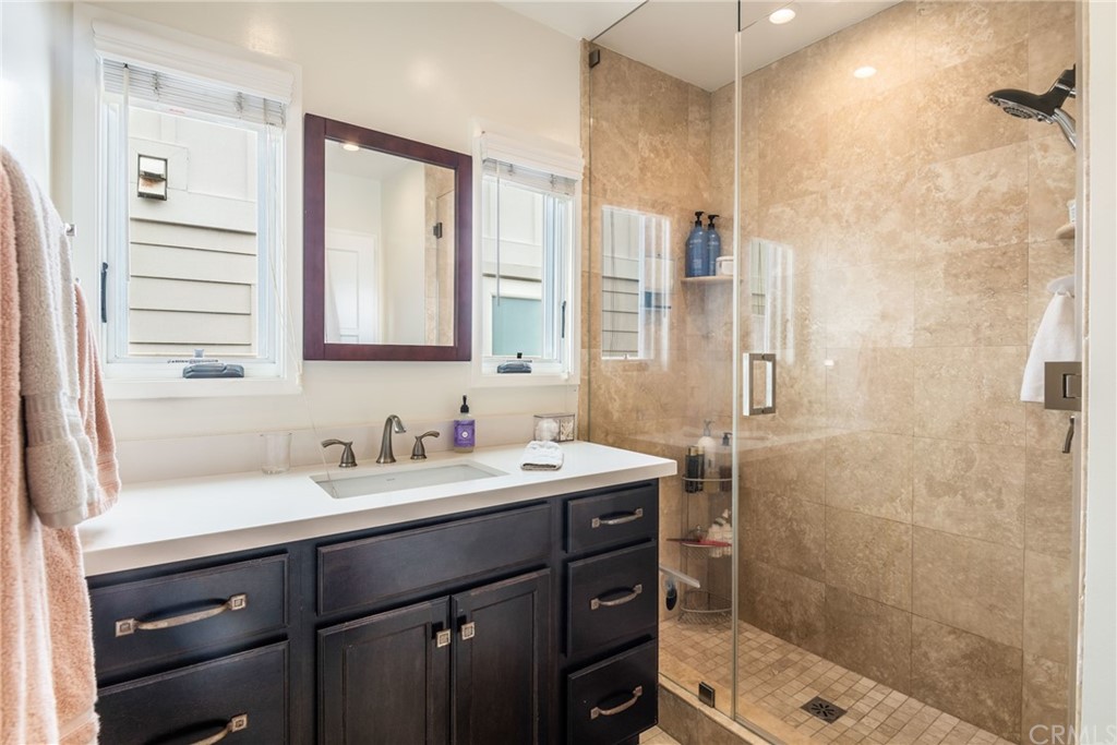316 7th Street Manhattan Beach, CA 90266 - Photo 21 of 34 a bathroom with a sink and a mirror