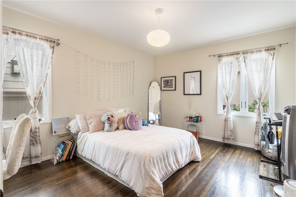 316 7th Street Manhattan Beach, CA 90266 - Photo 26 of 34 a bedroom with a bed and a large window