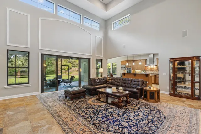 a bedroom with a bed dresser and a window