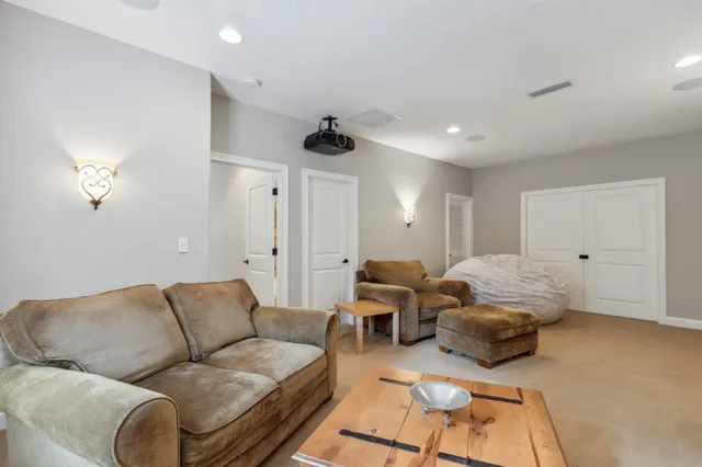 a view of a lake with houses in the back