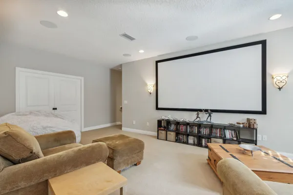 a front view of a house with a street