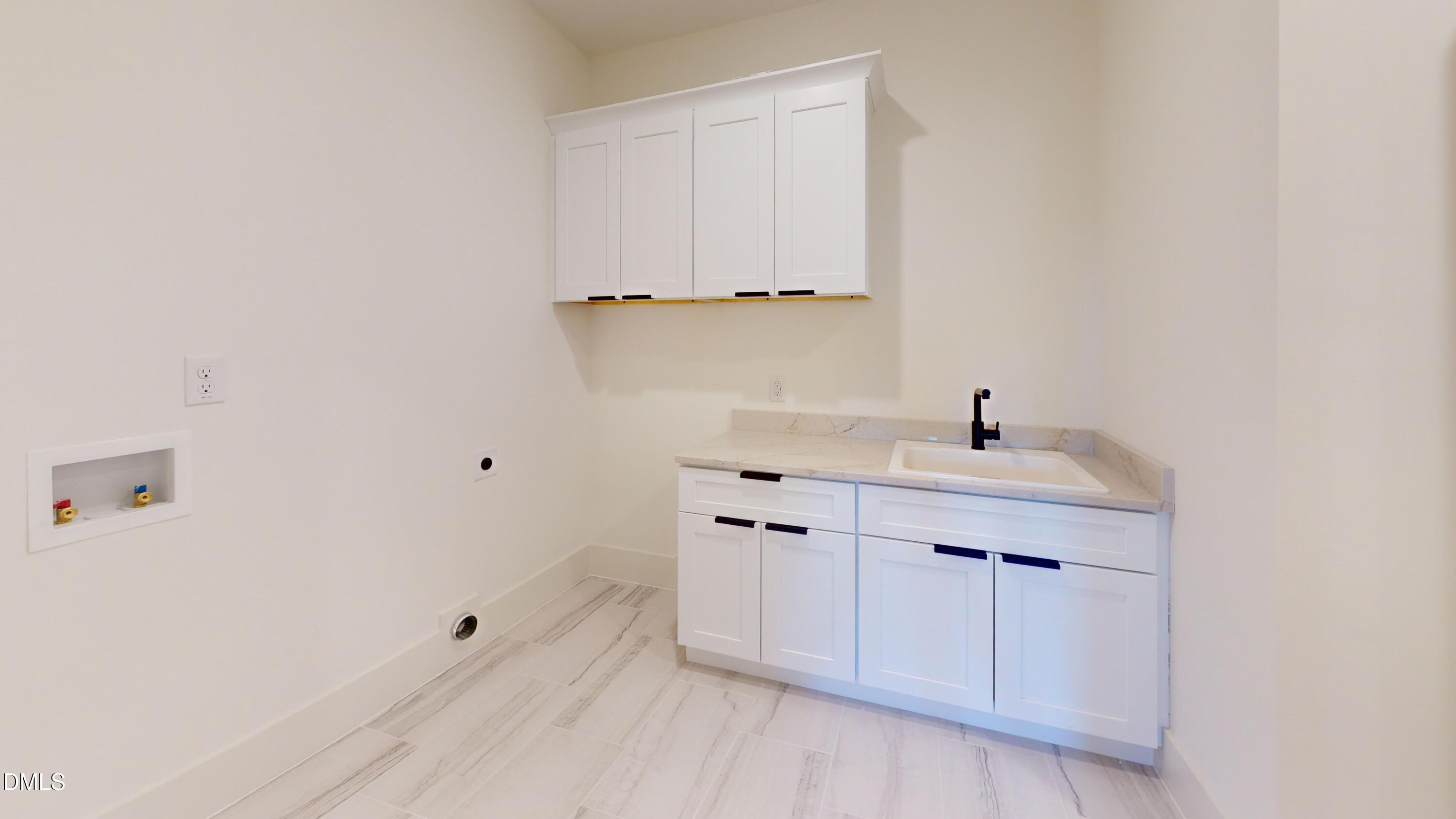 5008 Hopkins Chapel Road Zebulon, NC 27597 - Photo 32 of 32 5008-HopkinsChapel-Rd-Laundry