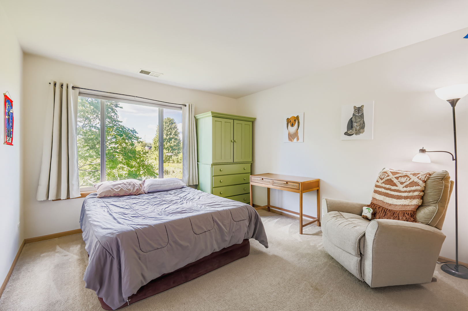 1409 Draper Road McHenry, IL 60050 - Photo 20 of 28 a bedroom with a bed and a couch