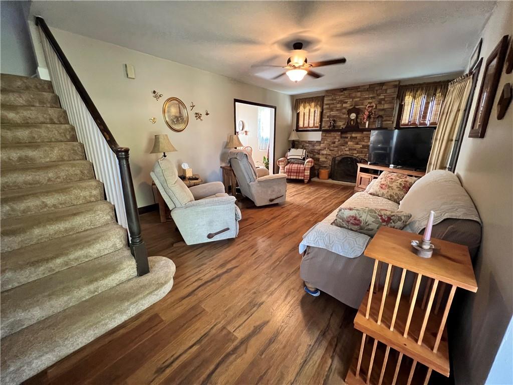 248 Ruth Street Pittsburgh, PA 15211 - Photo 4 of 24 a living room with furniture and wooden floor