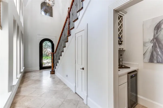 a view of an entryway with wooden floor